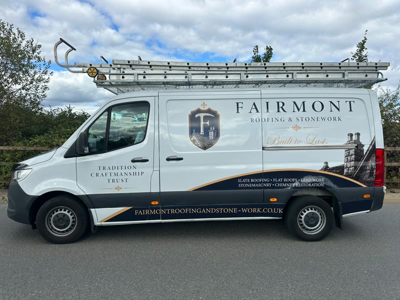 The Fairmont Roofing and Stonework van in full livery with its ladder rack